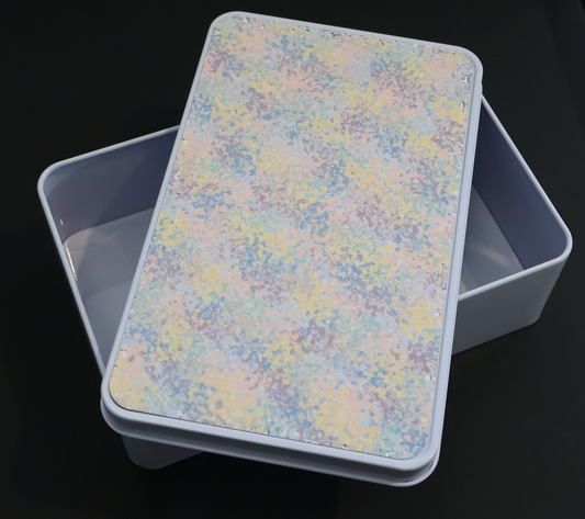 Storage tin with mottled pastel lid