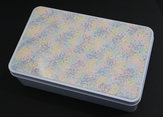 Storage tin with mottled pastel lid